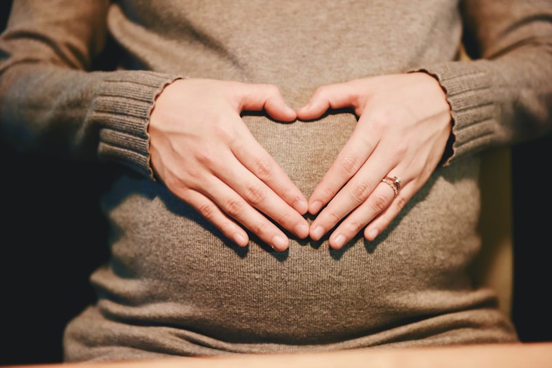 Midwife consultation with new mother